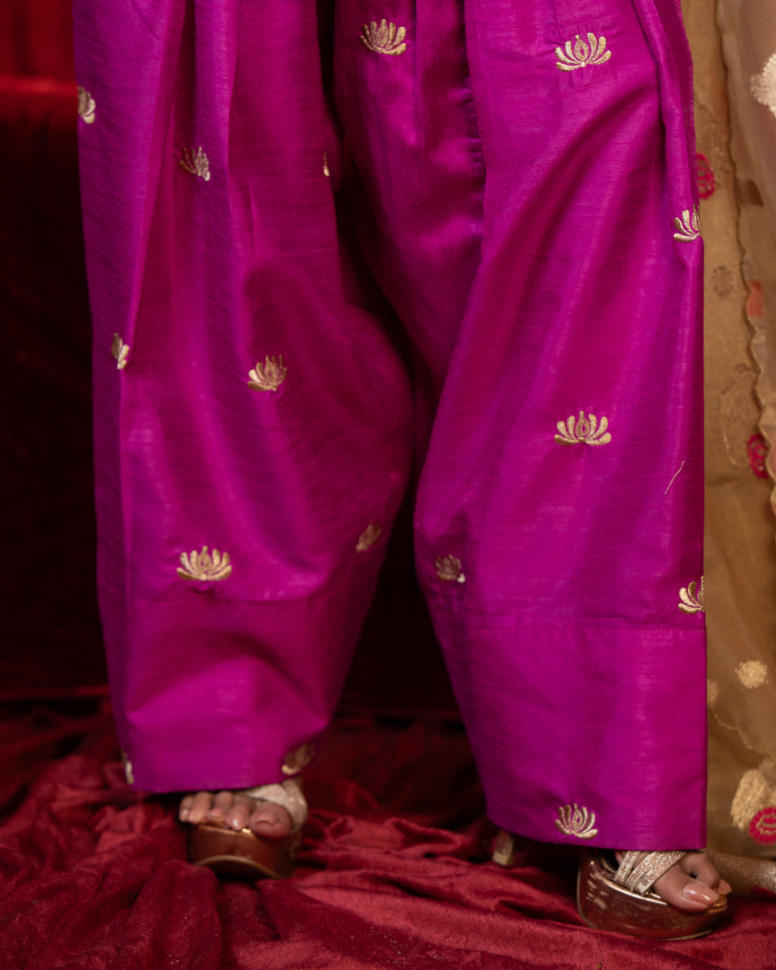 EVARA- Purple V-Neck Zari Embroidered Long Sleeve Raw Slik Kurta with Magenta Zari Farsi Salwar with Pockets & Organza Dupatta